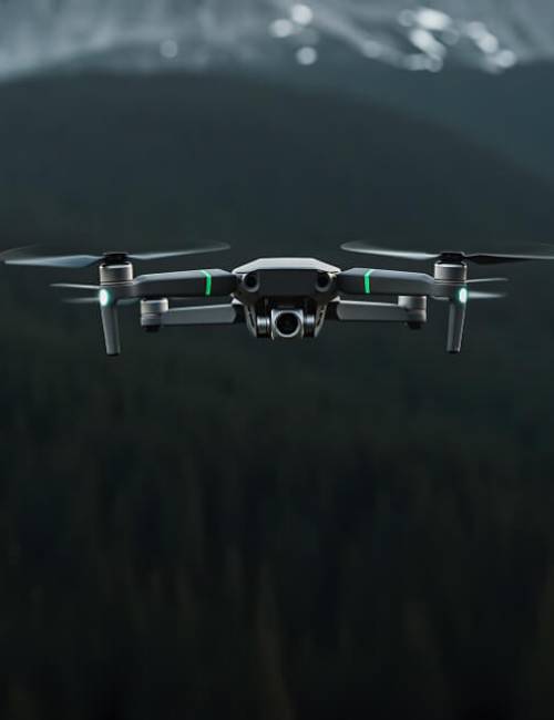 Drone flying over a mountain