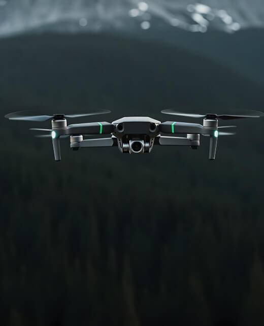 Drone flying over a mountain