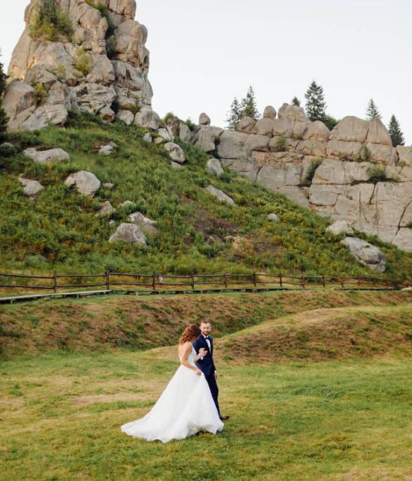 Romantic wedding couple in love walks in the mountains and forest